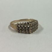 A small diamond three row ring in 9 carat setting.
