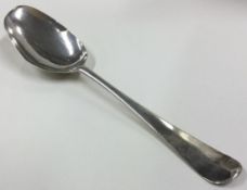 An 18th Century George III silver bottom marked tablespoon.