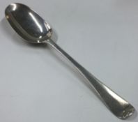 A large Queen Anne silver spoon. Circa 1730.
