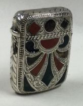 A Scottish style silver and stone vesta case with hinged lid.