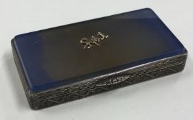 A silver and enamelled snuff box.