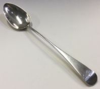 A large George III silver basting spoon. London 1790.
