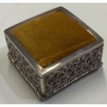 A large square 19th Century Indian silver pin cushion.