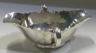 An unusual Victorian silver double-handled sauce boat. London 1900.
