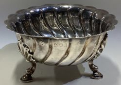 A Victorian silver bowl on three feet in the Continental style. London 1892.