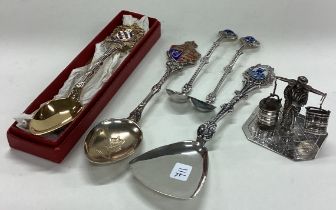 A large collection of silver souvenir spoons etc.