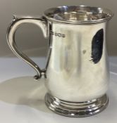 A silver half pint tankard. Sheffield 1958.