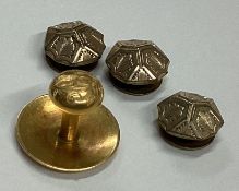 An 18 carat gold stud together with three gilt buttons.