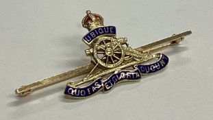 A 9 carat and enamelled Military brooch. Est. £50