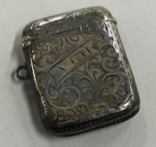 A silver vesta case with engraved decoration. Birmingham 1903.