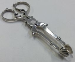 A pair of Georgian style silver tongs. Birmingham 1900.