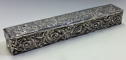 A large silver jewellery box embossed with flowers. London 1900.