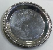 CARRS: A silver kiddush cup stand.