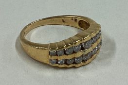 A diamond two row ring in 18 carat gold setting.