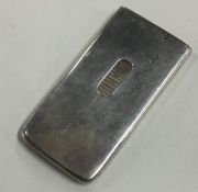 A silver match holder case with hinged lid. Birmingham 1925.