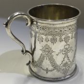 An engraved silver christening mug. Birmingham 1914.