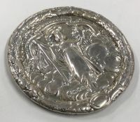 A heavy Antique silver chased medallion.