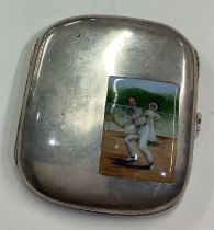 OF TENNIS INTEREST: A silver and enamelled cigarette case.