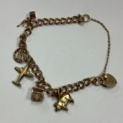 A small 9 carat curb link charm bracelet.