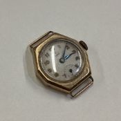 TUDOR: A small lady's 9 carat wristwatch.
