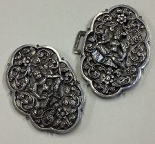 A fine pair of Thai silver interlocking buckles.