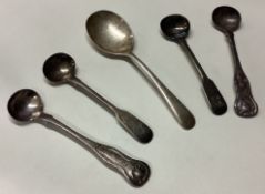 A collection of silver cruet spoons.