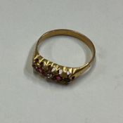 A small 9 carat gem set ring.