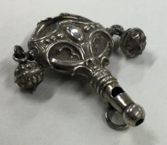 A silver combination rattle / whistle.