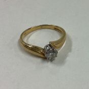 A good diamond single stone ring in 18 carat gold setting.