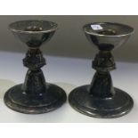 A pair of silver candlesticks chased with foxes. Birmingham 1972.