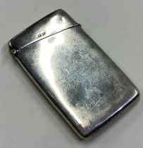 A silver card case with hinged lid. Birmingham 1909.