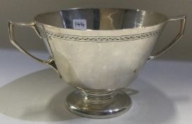 A large silver two-handled cup. London 1921.