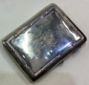 A silver card case with hinged lid. Birmingham 1909.