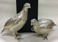 PATRICK MAVROS: A fine pair of heavy textured silver partridges in standing position.
