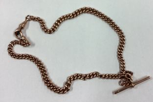 A 9 carat curb link watch chain with bar.