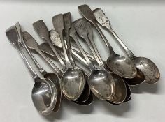 A large matched set of silver fiddle pattern teaspoons.