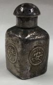 An early Chinese silver pepper shaker.
