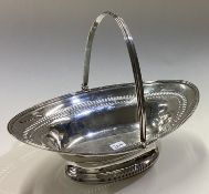 A Georgian silver pierced swing handle basket. London 1791.