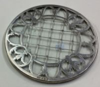 A silver inlaid and glass coaster. Birmingham 1928.
