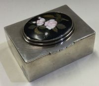A rare and unique silver triple stamp case of heavy gauge with large plaque carved with flowers.