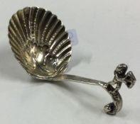An Antique Dutch silver caddy spoon.