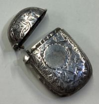 A silver vesta case with engraved decoration. Birmingham 1909.