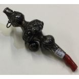 A Victorian silver rattle with coral teether.