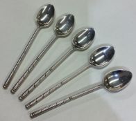 A set of five Russian silver spoons.