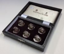A good cased set of six silver menu holders. London. By Mappin & Webb.