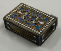 A heavy Russian silver and enamelled match holder.