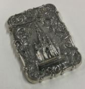 A fine chased silver castle top card case with embossed decoration depicting the Scott Memorial.