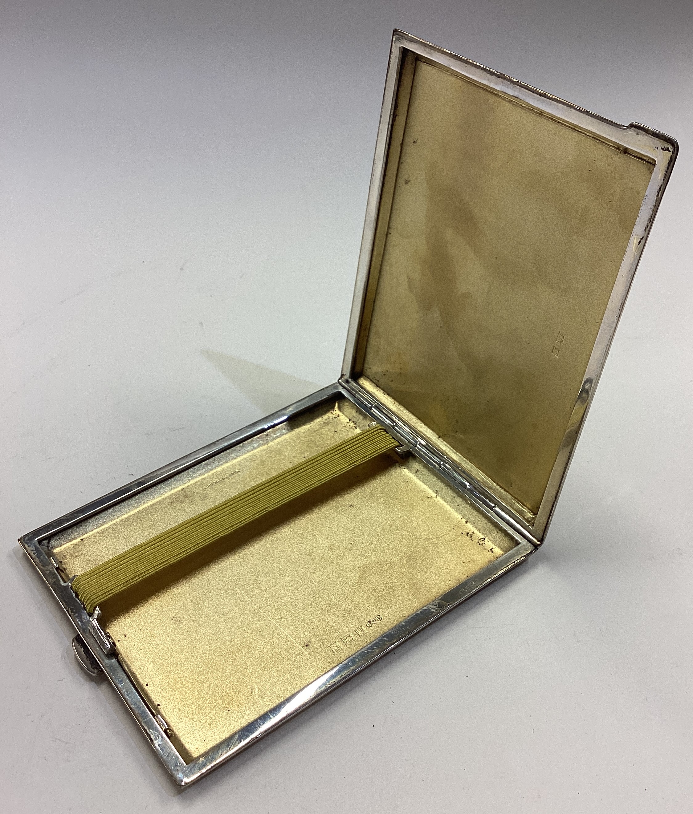 A silver and enamelled cigarette case decorated with flowers. - Image 2 of 2