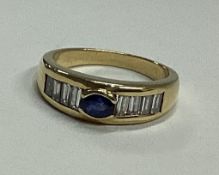 A good diamond and sapphire ring in 18 carat gold setting.