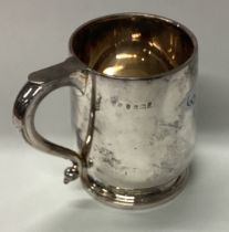 A small silver christening mug of Georgian style.